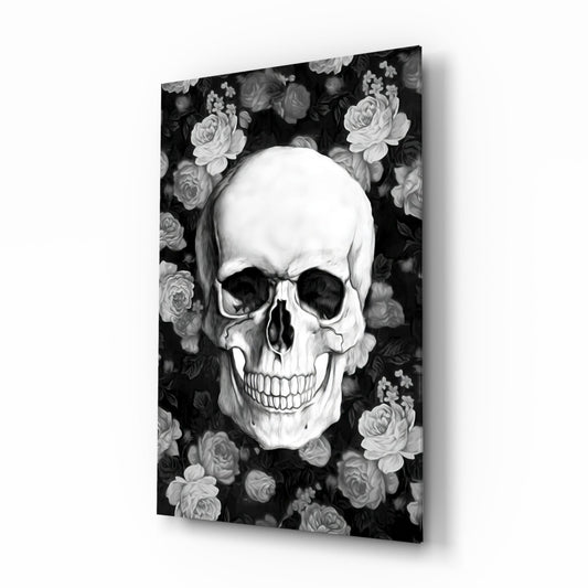 Black and white skull and roses glass wall art on a white background, tall piece shown at an angle