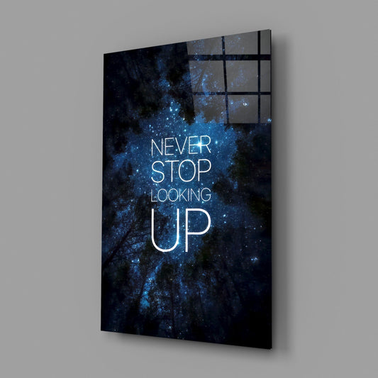 Starry forest motivational glass wall art on a plain gray wall