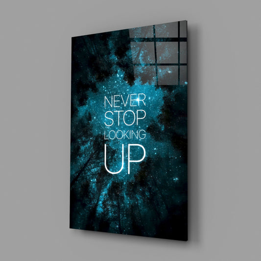 Teal night sky motivational glass wall art on a plain gray wall