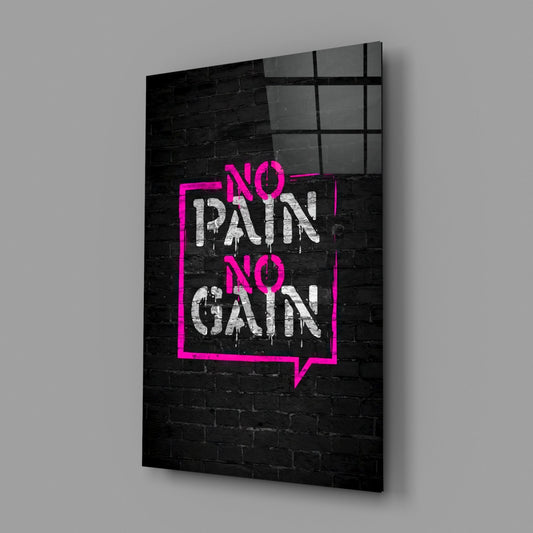 No pain no gain magenta graffiti glass wall art on a gray wall with a soft window reflection