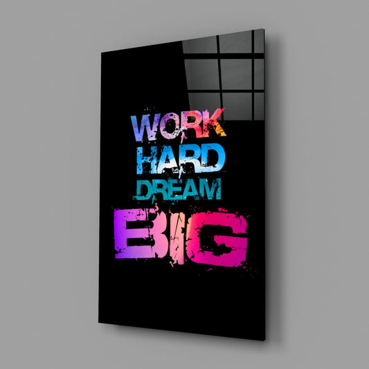 Work hard dream big in colorful letters on black glass wall art on a gray wall with a soft shadow