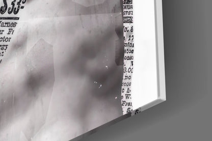Close-up of the glossy tempered glass edge on the marble statue on magenta newsprint collage print