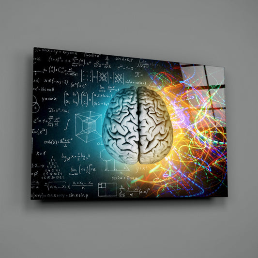 Left and right brain glass wall art angled on a plain gray background