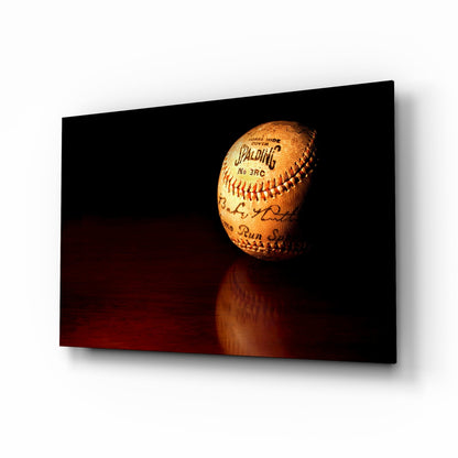 Vintage signed baseball glass wall art, orange stitching lit against black, high-gloss tempered glass