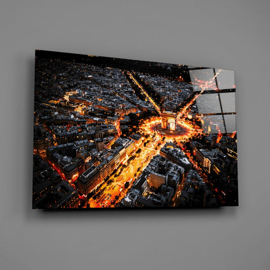 Paris aerial night glass wall art angled on a gray backdrop with light reflecting off the glossy front