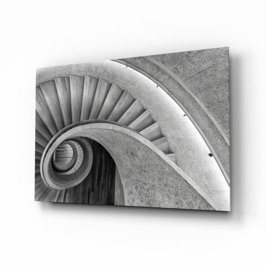 Spiral staircase printed on glass, shown at an angle on a white background