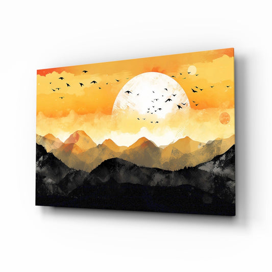 Flat graphic landscape of black mountains, a white sun and flying birds in an orange sky, printed on glass, angled view