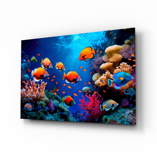 Ocean life coral reef glass wall art with clownfish and tangs, vivid cobalt and tangerine tones