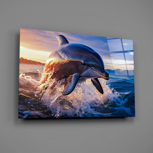 Leaping dolphin glass wall art on a gray wall, light reflecting off the glossy front
