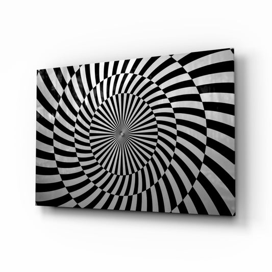 Black and white spiral of curved stripes radiating from a center point, printed on glass, angled view on white