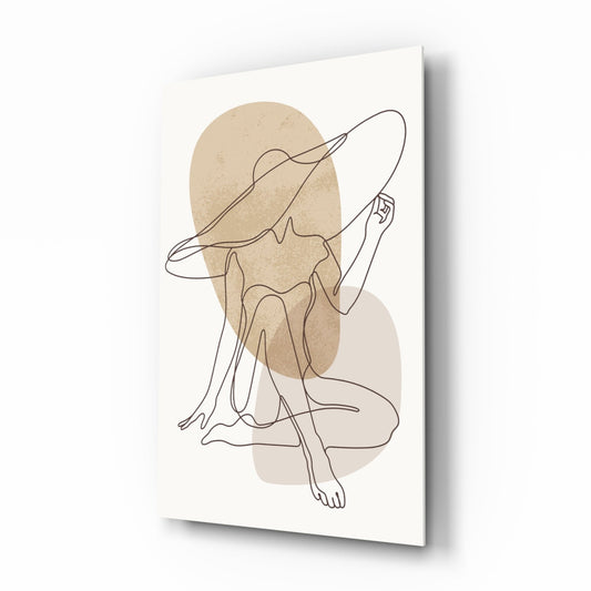 Single line drawing of a seated woman in a wide-brim hat over soft beige and blush shapes, printed on glass, angled view