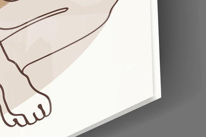 Close-up of the glass edge and glossy surface over the line-drawn foot on cream