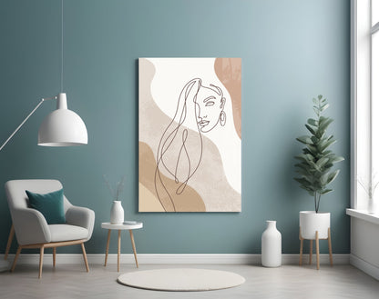 Line art woman with flowing hair glass wall art on a teal wall above a gray armchair and a white pendant lamp