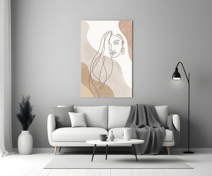 Line art woman with flowing hair glass wall art above a white sofa beside a black arc floor lamp