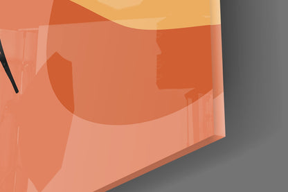 Close-up of the glass edge and glossy surface over the terracotta and peach shapes