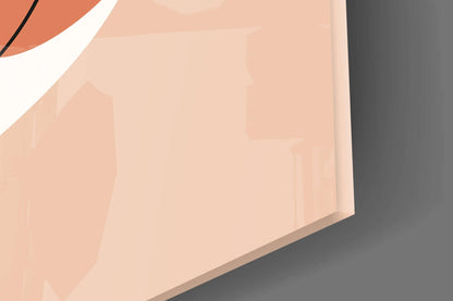 Close-up of the glossy tempered glass edge on the peach line art face wall art