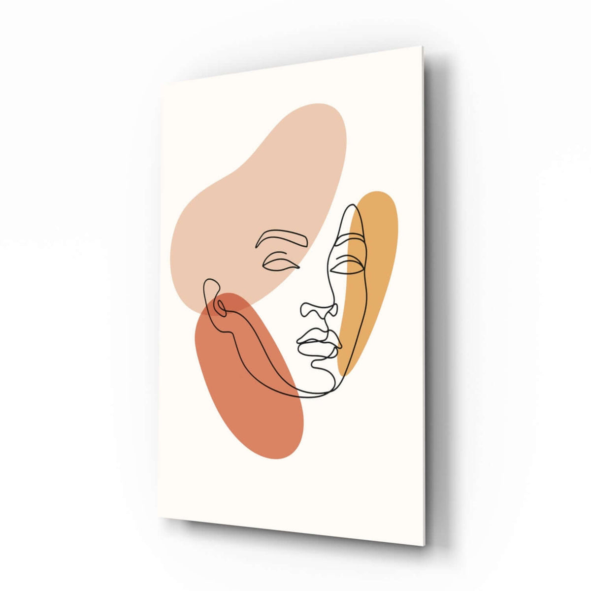 Line art woman face glass wall art: one black line drawing over blush, peach and terracotta shapes on cream